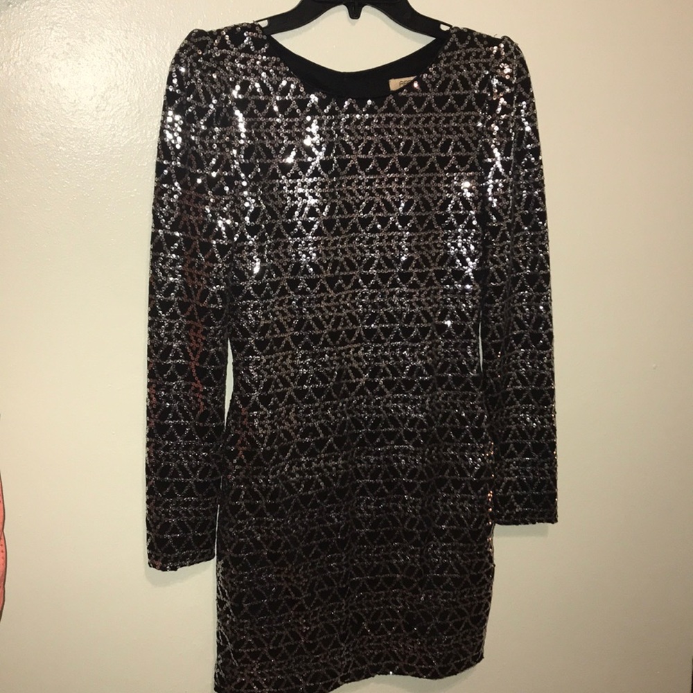 This is a silver and black, open back dress.